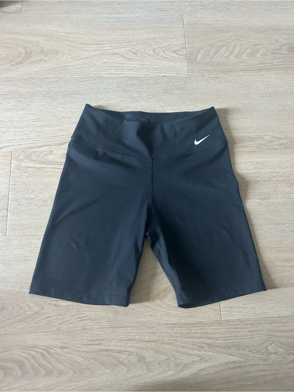 Nike Black Women’s Mid-Rise Bike Shorts with White Swoosh